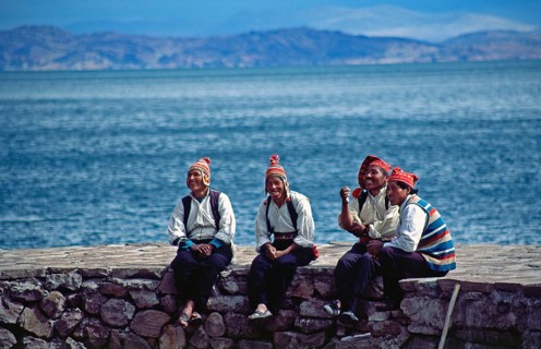 Men wearing traditional clothing on Isla Taquile in Lake Titicaca, Andean Highlands, Peru, South