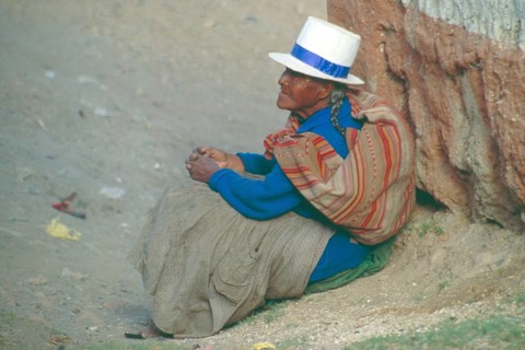 Old woman sitting on the side of the road, Cusco, Andean highlands, South America, September 1997,