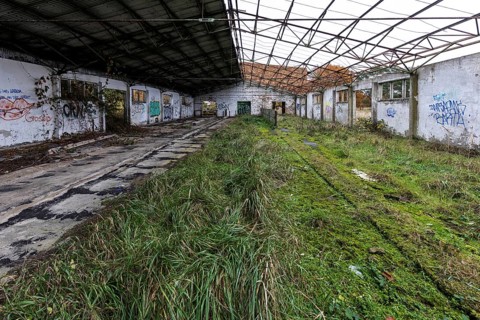 Former hall, dilapidated plant of a former agricultural production cooperative of the former GDR,