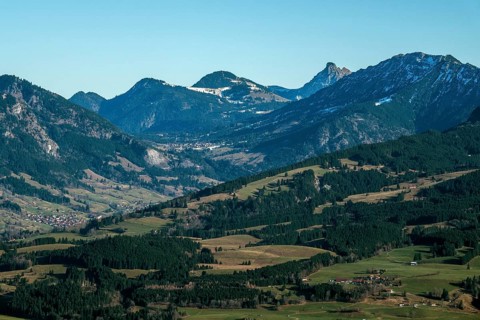 View from the Bolsterlanger Horn of villages in the Illertal and mountains of the Allgäu Alps,
