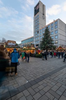 The Christmas market on the market square, in front of Stuttgart City Hall 2025, shines in festive