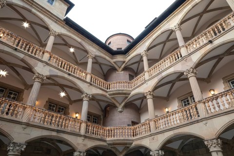 At Christmas time, the Old Palace in Stuttgart shines with festive poinsettias in the courtyard.