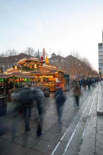 Königstraße with Stuttgart 2025 Christmas Market on Schlossplatz with festive lights, a Christmas