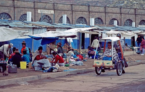 People, woman, market, rickshaw, Puno on Lake Titicaca, Andean highlands, Peru, South America,