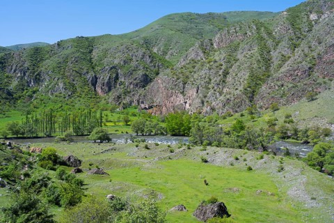 Green valley with agricultural environment and rolling hills. Scenic view, Kura River, Nakalakevi