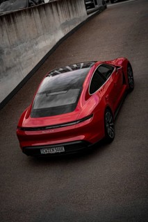 Red Porsche Taycan from a bird's eye view with focus on roof contours and rear, Porsche Taycan,
