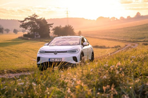 Car at sunset in peaceful countryside, VW ID4 electric car, Deer Carsharing, Calw, Germany