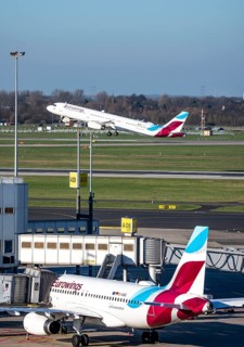 Eurowings aircraft, at terminal A and at takeoff, Düsseldorf airport, DUS