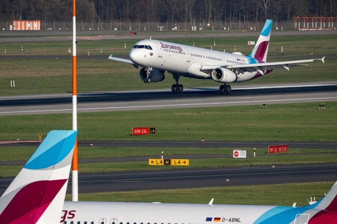 Eurowings aircraft, on field positions and on landing, Düsseldorf airport, DUS