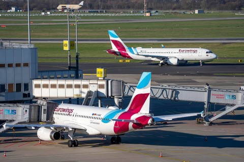 Eurowings aircraft, at terminal A and on their way to takeoff, Düsseldorf airport, DUS
