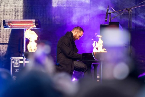 Igor Levit (pianist) plays the piano at the lighting of the 20th anniversary Hanukkah in front of