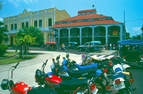 Motorbikes, iron house built by Gustav Eiffel in the center of Iquitos on the Amazon, Peru, South