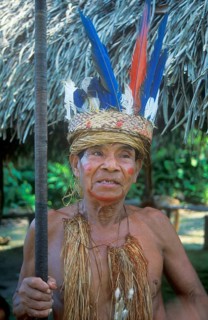 Chief of a Yagua tribe near Iquitos on the Amazon poses for photos, Peru, South America, September