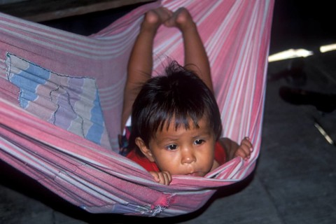 Little child in hammock, village of Pantoja near Iquitos, Peru, South America, September 1997,
