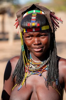 Portrait, brightly decorated woman of the Hakaona tribe, also Havakona or Hakawona, near Opuwo,