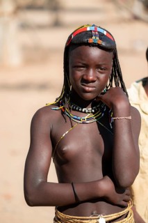 Portrait, brightly decorated girl of the Hakaona tribe, also Havakona or Hakawona, near Opuwo,