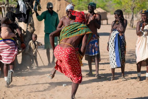 Traditional dance, brightly decorated woman and men from the Hakaona tribe also Havakona or