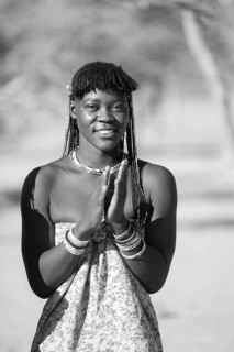 Black and white, traditional dance, brightly decorated woman of the Hakaona tribe dance, also