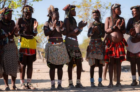 Traditional dance, brightly decorated woman of the Hakaona tribe also dance Havakona or Hakawona,