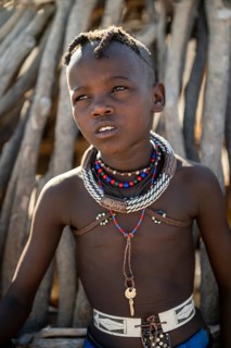 Portrait, Himba boy, traditional Himba village, Kaokoveld, Kunene, Namibia