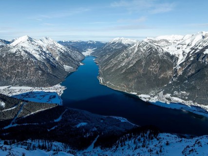 Epic view of mountain landscape with snow in winter, Achensee, Tyrol, Austria