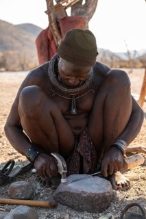 Elderly man, Himba blacksmith, traditional Himba village, Kaokoveld, Kunene, Namibia