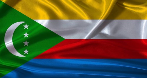 National flag of Comoros with cloth texture. Comoros flag with realistic texture background