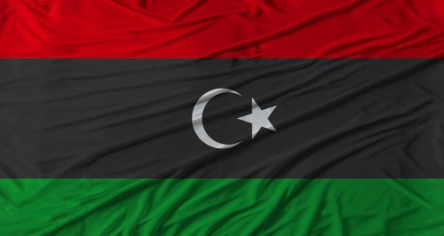 Libyan flag waving. Flag of Libya with cloth texture