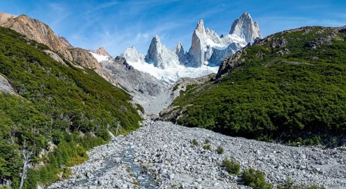 Epic panorama, rocky mountain landscape, glacier and summit of Monte Fitz Roy in the background,