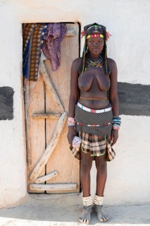 Portrait, brightly decorated woman of the Hakaona tribe, also Havakona or Hakawona, near Opuwo,