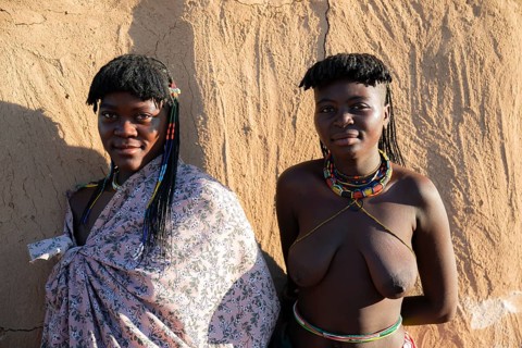 Portrait, brightly decorated woman of the Hakaona tribe, also Havakona or Hakawona, near Opuwo,