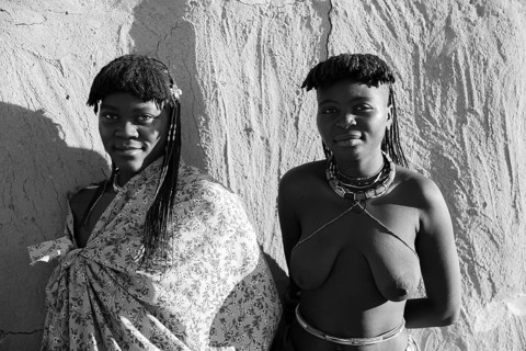Black and white, portrait, brightly decorated woman of the Hakaona tribe, also Havakona or