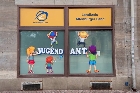 Colourful illustrations of children playing, Youth Welfare Office, Altenburg, Thuringia