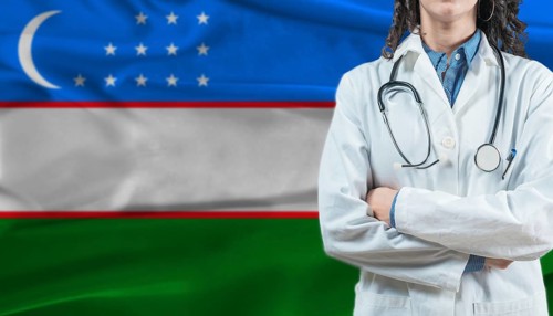Medical professional on Uzbekistan flag. Healthcare and wellness in Uzbekistan, Concept