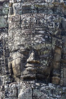Huge stone-carved faces of Bodhisattva Lokeshvara, also Avalokiteshvara, Bayon Temple, Angkor Thom,