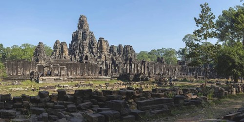Panoramic picture of the south side of Bayon Temple, with huge stone-carved faces of Bodhisattva