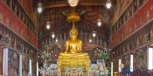 Golden Buddha statue with Bhumispara-mudra, Buddha Gautama at the moment of enlightenment,