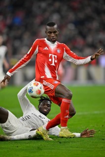 Tackle, action Danny da Costa 1. FSV Mainz 05 (21) against Nicolas Jackson FC Bayern Muenchen FCB