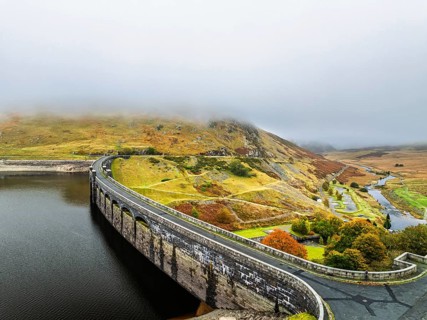 Autumn over Claerwen Dam, Claerwen Valley, Elan Valley Reservoir, Rhayader, Powys, Wales, UK
