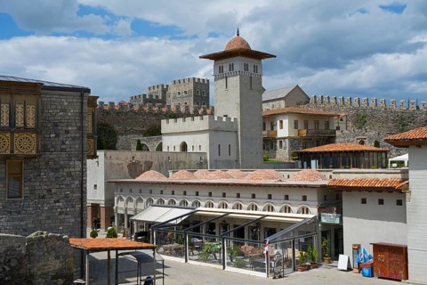 An extensive medieval complex with a distinctive watchtower and battlements, Rabati Fortress,