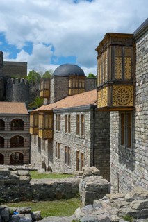 Stone architecture with decorative wooden elements and a dome in the courtyard, Rabati Fortress,