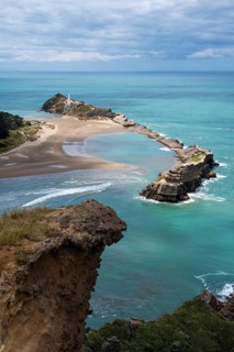 Deliverance Cove and Castlepoint Lighthouse, Castle Rock views, rocks, ocean. Castlepoint,