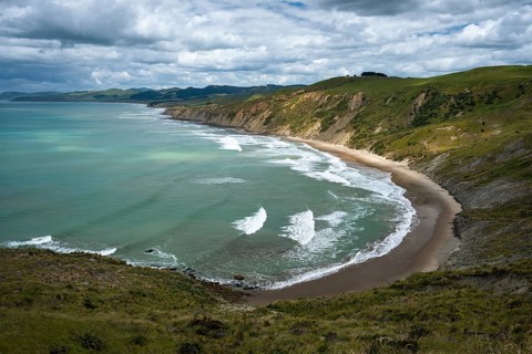 Wairarapa coast, sea, mountains. Castlepoint, Wairarapa Coast, Wellington Region, North Island, New