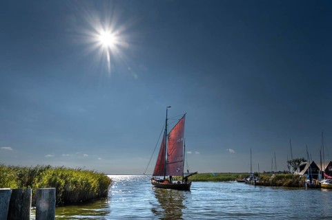 Zeesboot, former historic fishing boat, leaves the port of Ahrenshoop, Sonnenstern, Darß,