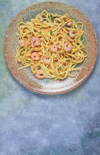 Spaghetti with shrimp, in cream sauce, top view, no people