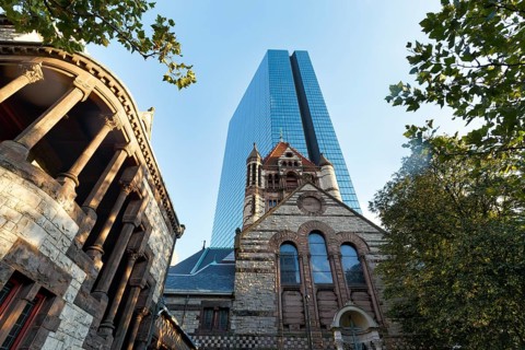 Trinity Church in front of glass façade, John Hancock Tower, various architectural styles on Copley