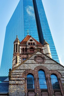 Trinity Church in front of glass façade, John Hancock Tower, various architectural styles on Copley