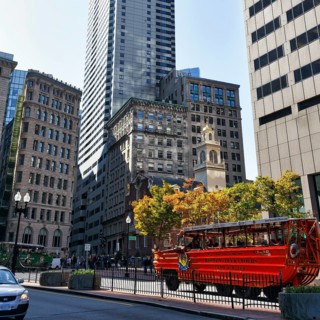 Boston Duck Tour, special city tour in amphibious vehicle from World War II, red bus in front of
