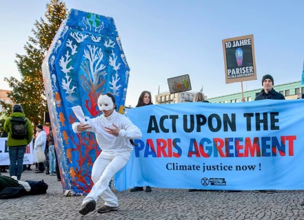 Dancers from Extinction Rebellion dance at Fridays for Future rally to mark the tenth anniversary