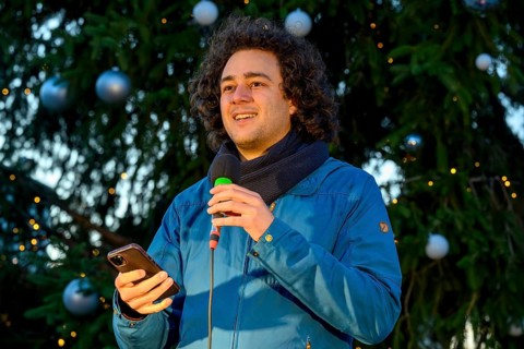 Louis Motaal speaks at Fridays for Future rally to mark the tenth anniversary of the Paris
